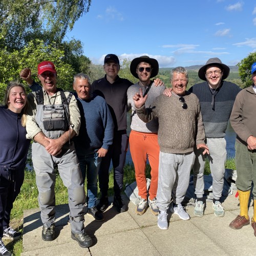 Here's a great group of River Tay guided salmon fishing guests with 2 top professional Tay salmon guides of ours posing for a group shot directly outside the Kinnaird Beat fishing hut which is 15 minutes from Dunkeld.