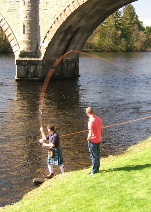 Here's 'Graham Of Menteith' kilted Jock Monteith out teaching the traditional Spey cast underneath the Tay's Telford Bridge at Dunkeld. Look at the perfect D-Loop rod loading perfection.