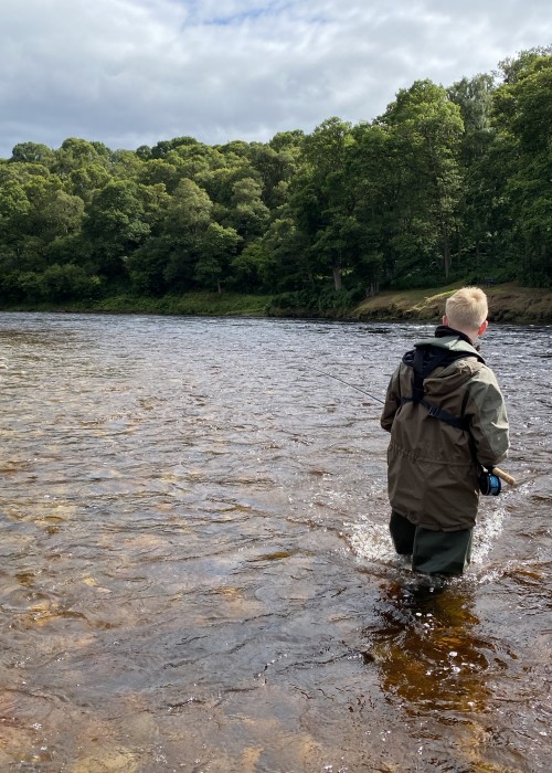 You should never wade too deep on a salmon river where it becomes difficult to balance due to fast moving water pushing on the back of your legs as seen here. If this happens just come back a foot or two and life will be much more comfortable while wading.