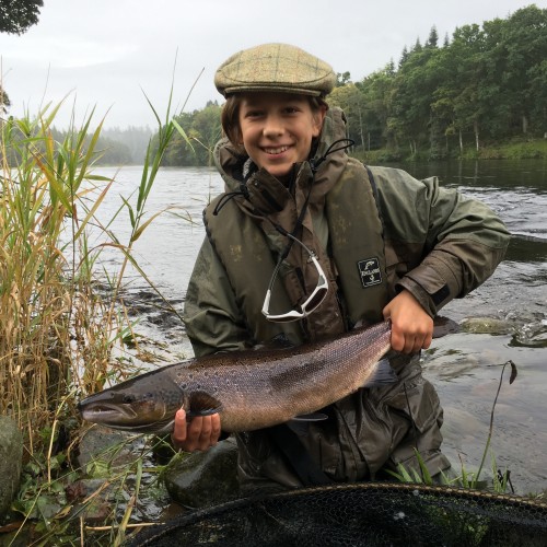 This young man hooked and landed this Autumn salmon directly behind the underwater croy in the broken water in this photograph which is located on the River Tay near Dunkeld. With the first tug on his fly reel he looked at me and waited for me to tell him exactly when to clamp the reel to properly set the fly hook which he did perfectly.