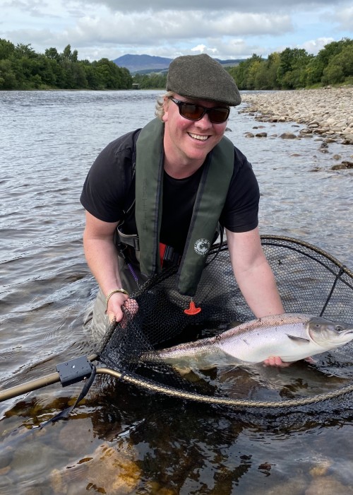This smiling salmon fly fisher still had the adrenalin flowing through his veins after hooking and taming this perfect Summer salmon on his brand new Loop salmon fly rod. This is what fresh run Summer salmon look like on the River Tummel where this perfect fish was caught. The salmon pool in the photograph is called the 'Mike's Run' pool which is the last River Tummel salmon pool before it joins the River Tay.