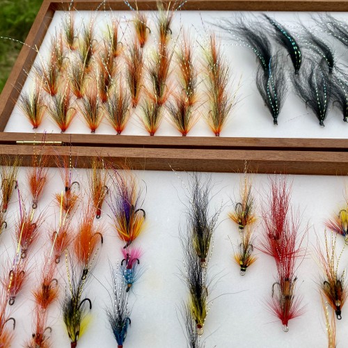 What a nice selection of Scottish salmon flies to choose from at the start of the fishing day. Rather than lugging a big fly box around like this simply select a few at the start of the fishing day to match the water conditions and put them in a smaller fly box in your pocket.