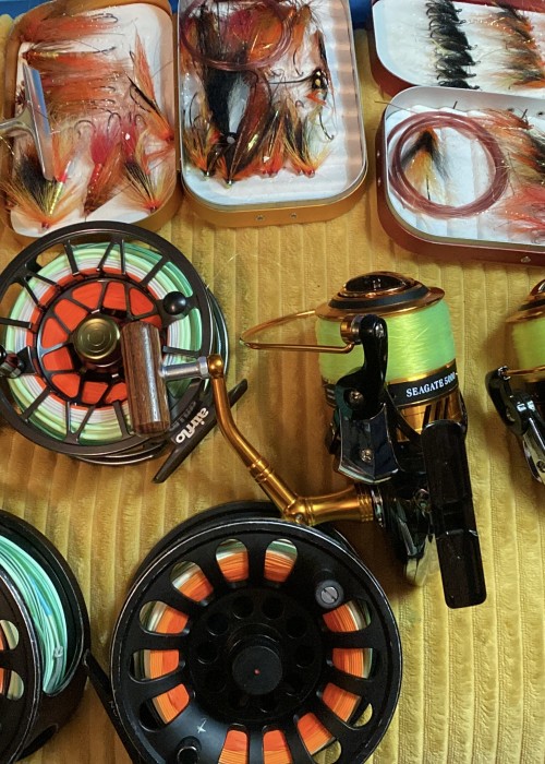I've always had an obsession with fishing kit since my early childhood days and that obsession hasn't gone away. Look at these reels and salmon flies all getting dried out after a day on the river before getting stored away again.