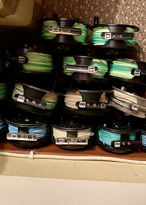 When you're dealing with dozens of salmon fly reels that have different use fly lines on each reel we use a reel foot numbering system for easy ID purposes as you can see in this photograph. When a salmon guide collects a reel he knows exactly what he's got and the line weight and line design to suit the suspected needs of the fishing guest and the prevailing water conditions.