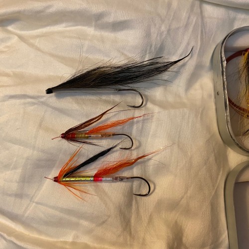 These 3 flies hooked and landed a total of 4 salmon the same day I took this photograph and I was just drying them out after coming off the river before putting them back in their aluminium Wheatley fly box.