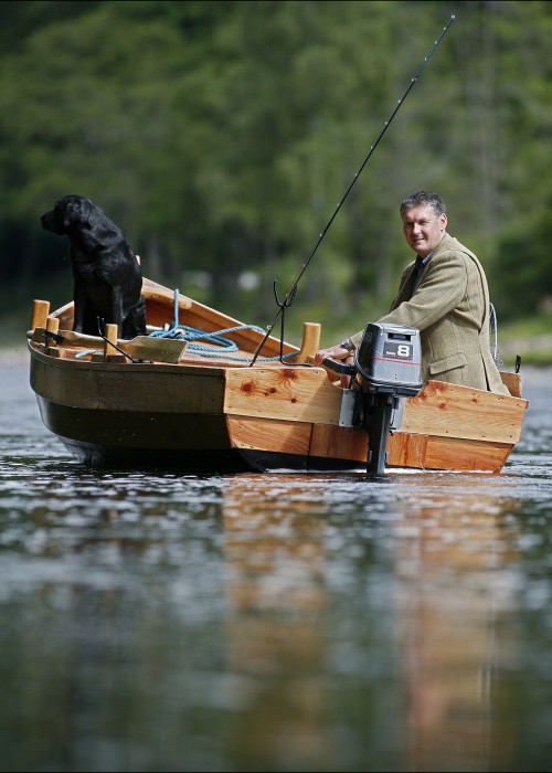 This shot of me and my black labrador dog 'Selkie' was taken on the River Tay near Dunkeld by top Scottish photographer Peter Sandground. The salmon pool we are in here is the Cottar Pool on the Newtye Beat where I was serving as Head Ghillie at that time.