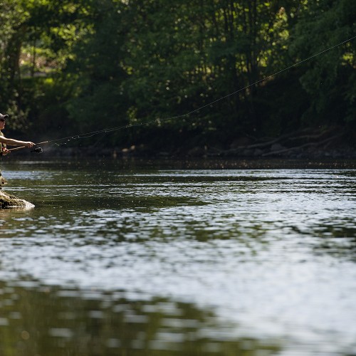 As a professional salmon fishing guide I can assure you there's just as much tactical salmon pool water coverage planning involved in spin fishing as there is with fly fishing. This River Tay spin fisher in the shot was powering out a lure as this picture was taken at Dunkeld in Perthshire.