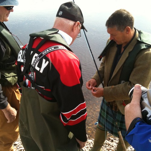 Here's Jock Monteith out showing a group of visiting Canadian salmon fishers how we tie on a salmon fly in Scotland. This shot was taken on the left hand bank of the Gean Tree Pool of the River Tay near the village of Murthly.