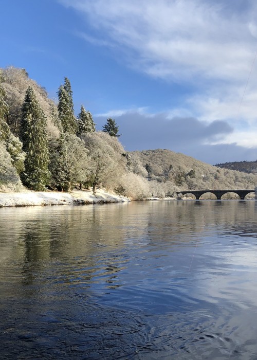 Here's a perfect bright light early Spring salmon fishing shot which was taken from the salmon boat at Dunkeld on the River Tay in Perthshire. In the distance you can clearly see the historic Telford Bridge which was build from sand stone over 200 years ago.