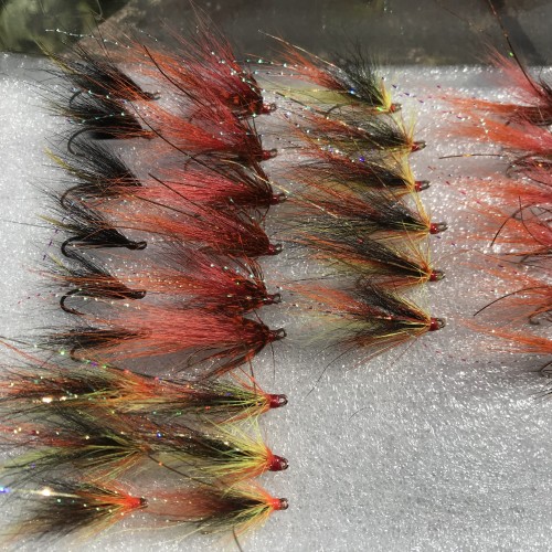 Here's a box with 3 newly tied salmon fly patterns that do well on the Scottish rivers. The red fly is the Jock's Shrimp, the block fly is the Silver Stoat and the black, yellow & orange fly is the Monteith Copperass fly.