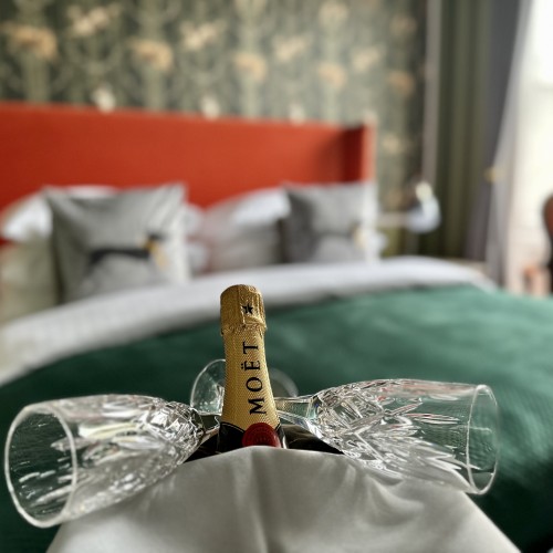 Here's a lovely appointed bedroom in the Atholl Arms Hotel in Dunkeld with the champagne on ice. This award winning hotel overlooks the River Tay and has been a firm favourite for visiting salmon fishers and their families for many decades.